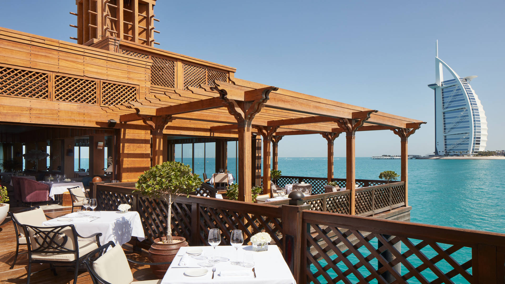 Pierchic terrace at Jumeirah Al Qasr overlooking the Burj Al Arab