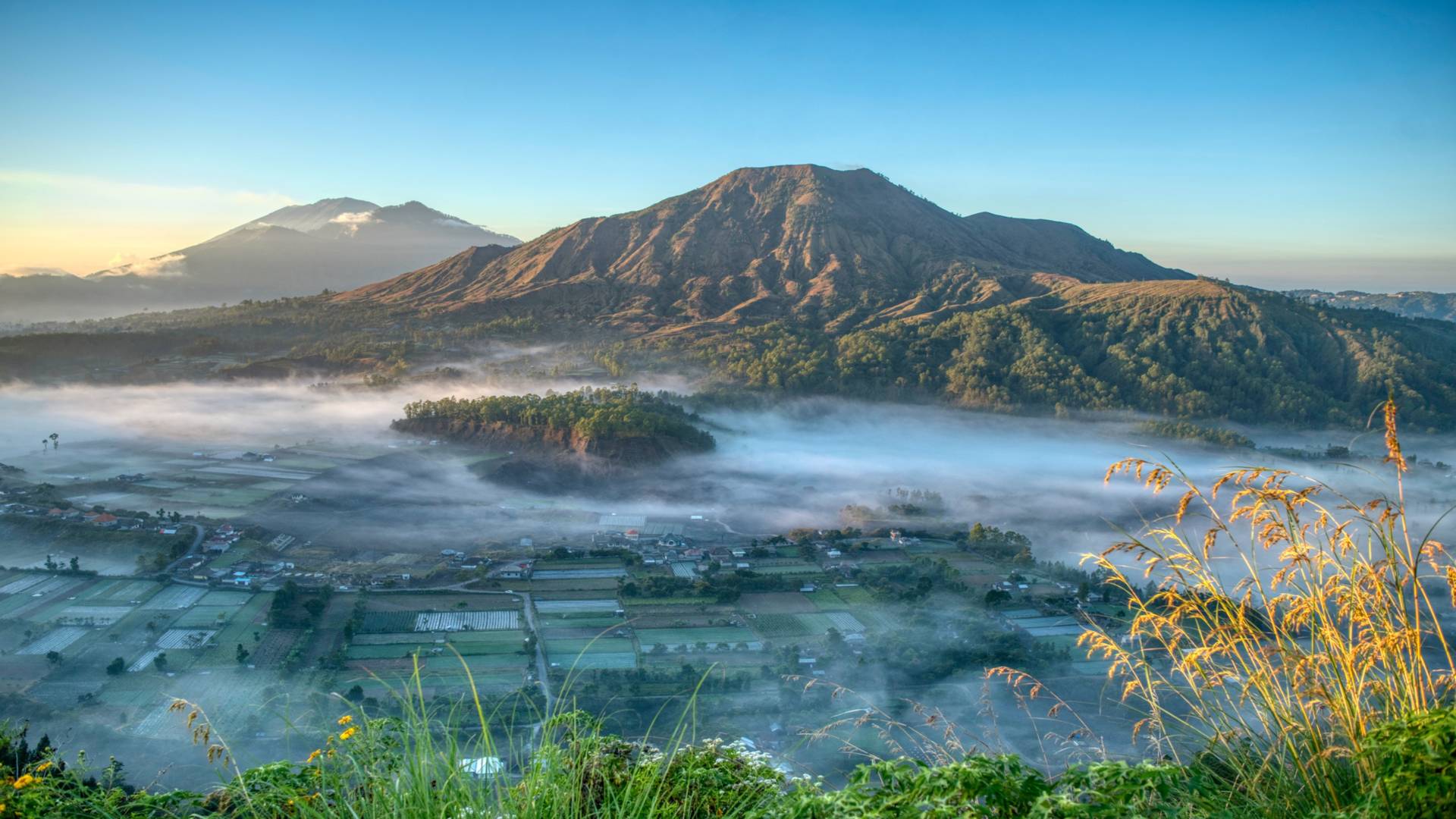 Mount Batur at sunrise, a day trip from Jumeirah Bali