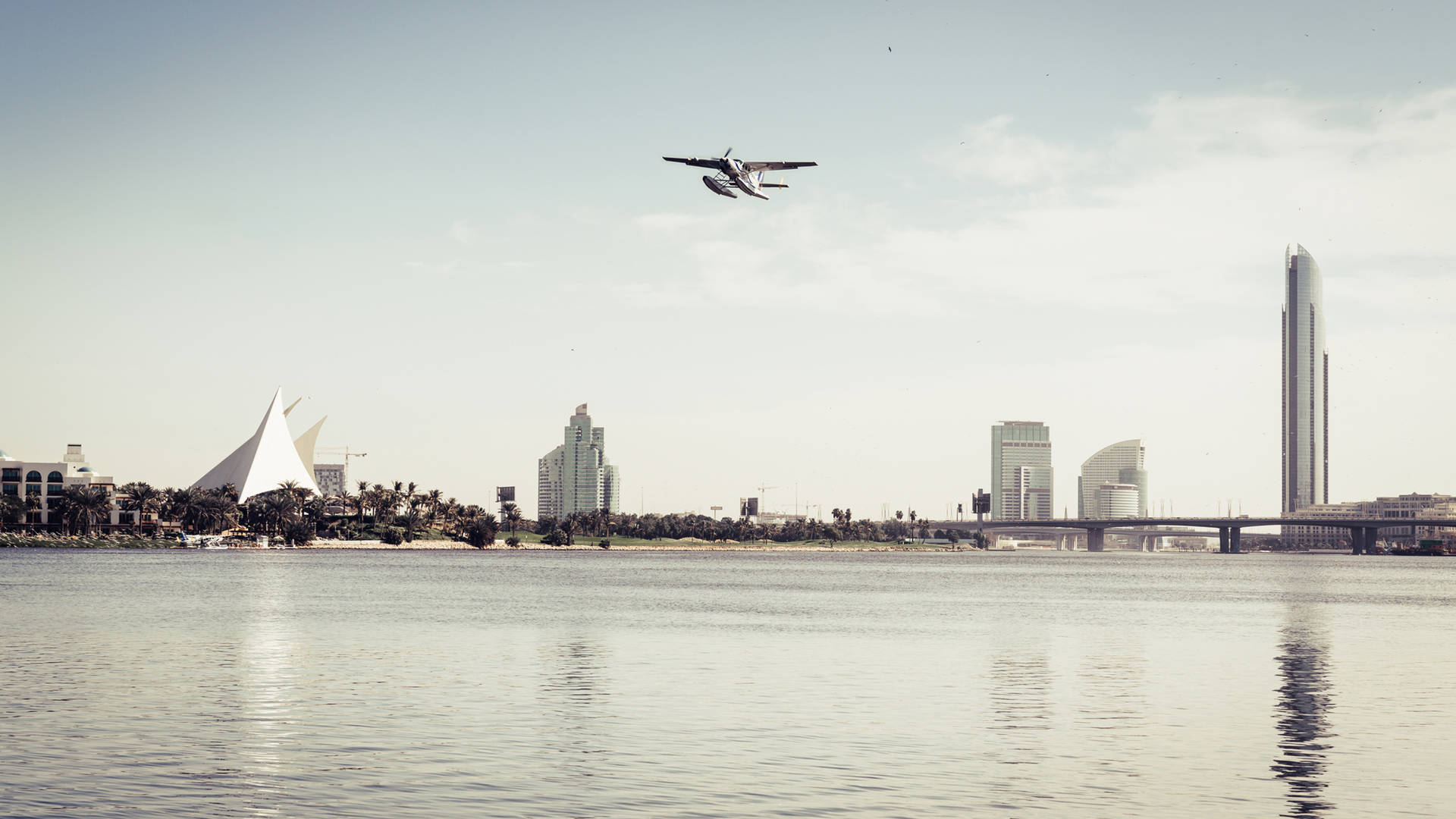 Seaplane taking off over Dubai creek