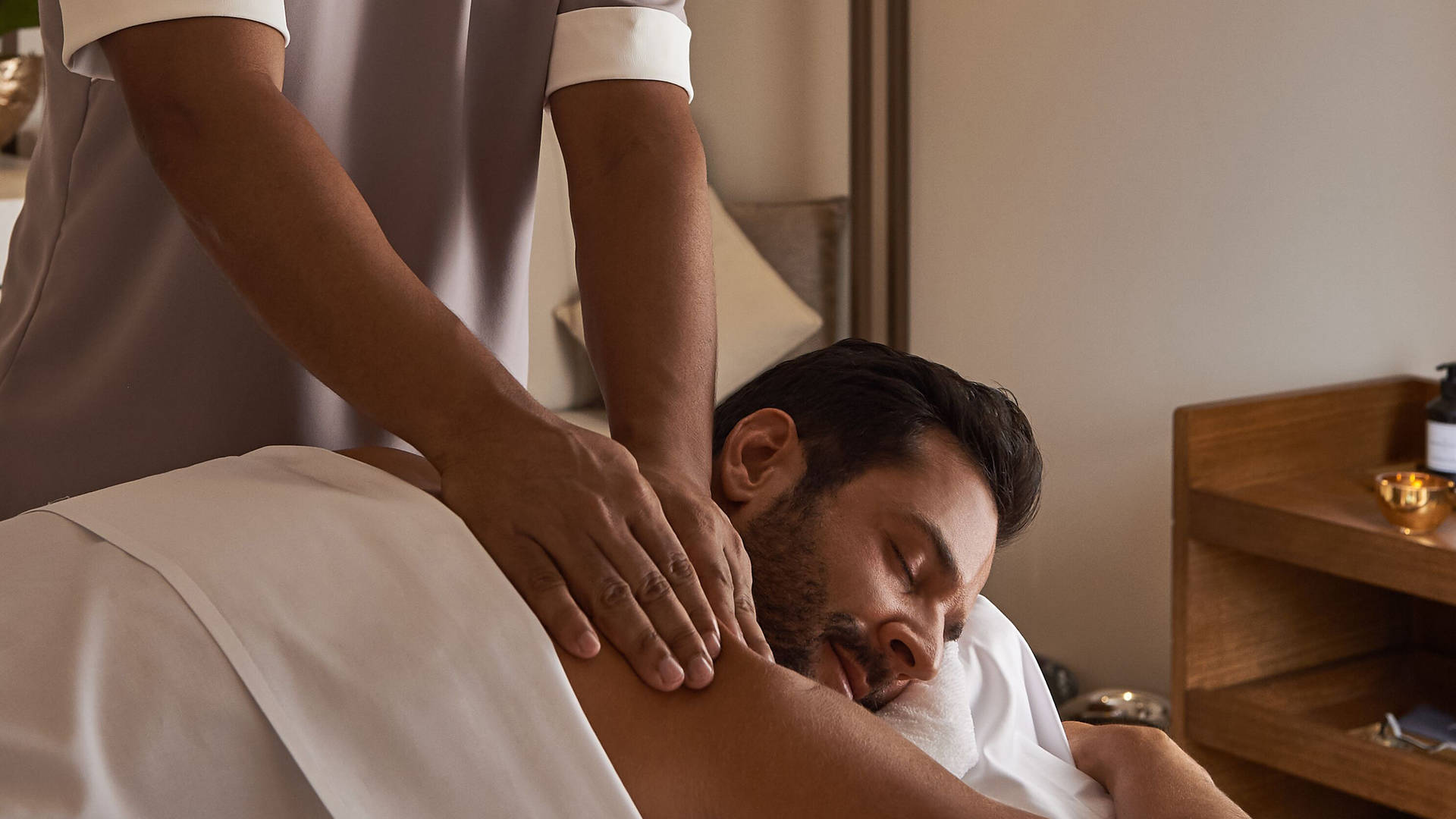 A man having a massage at Talise Spa