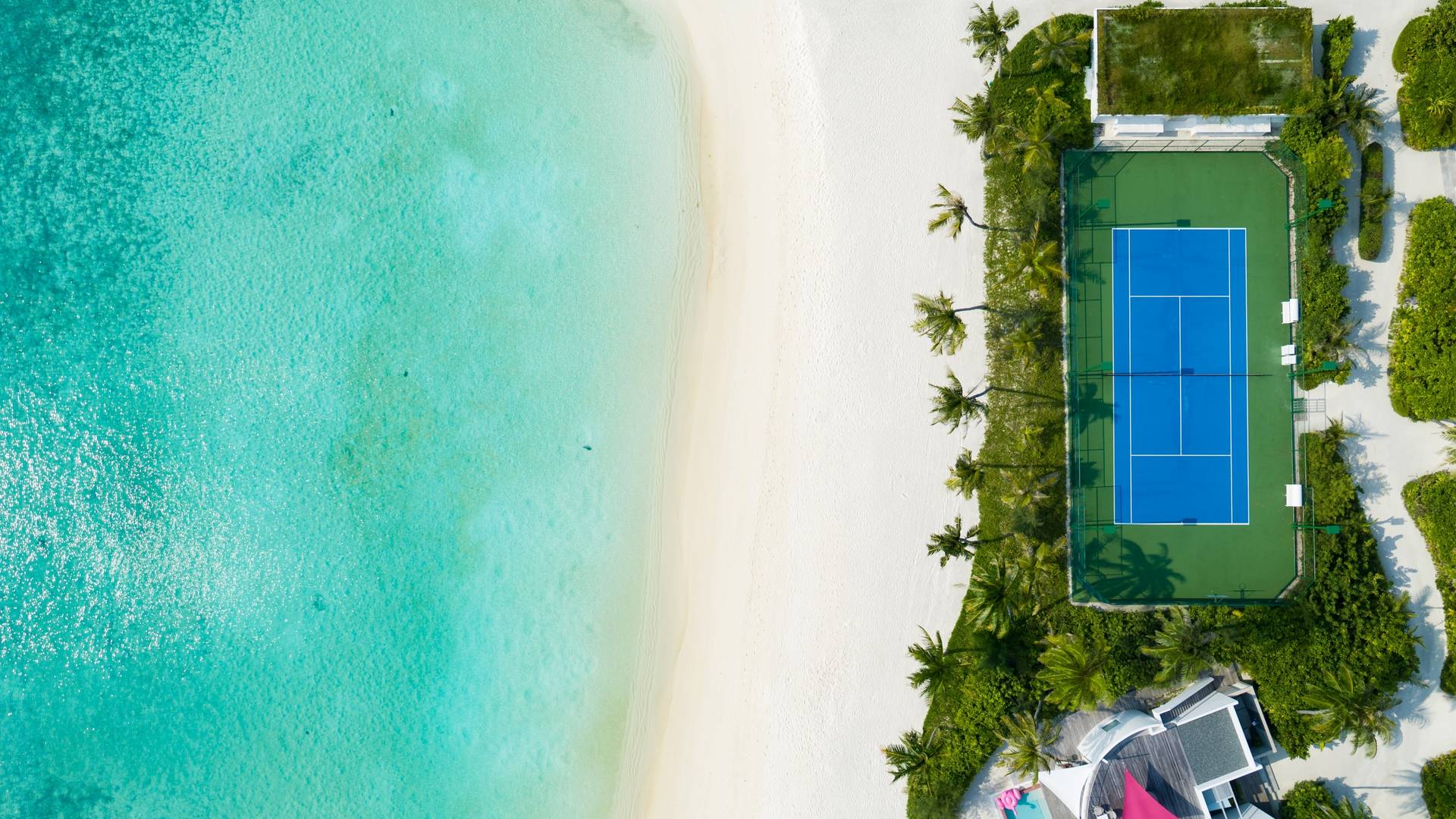 Jumeirah Maldives tennis court from a bird's eye view