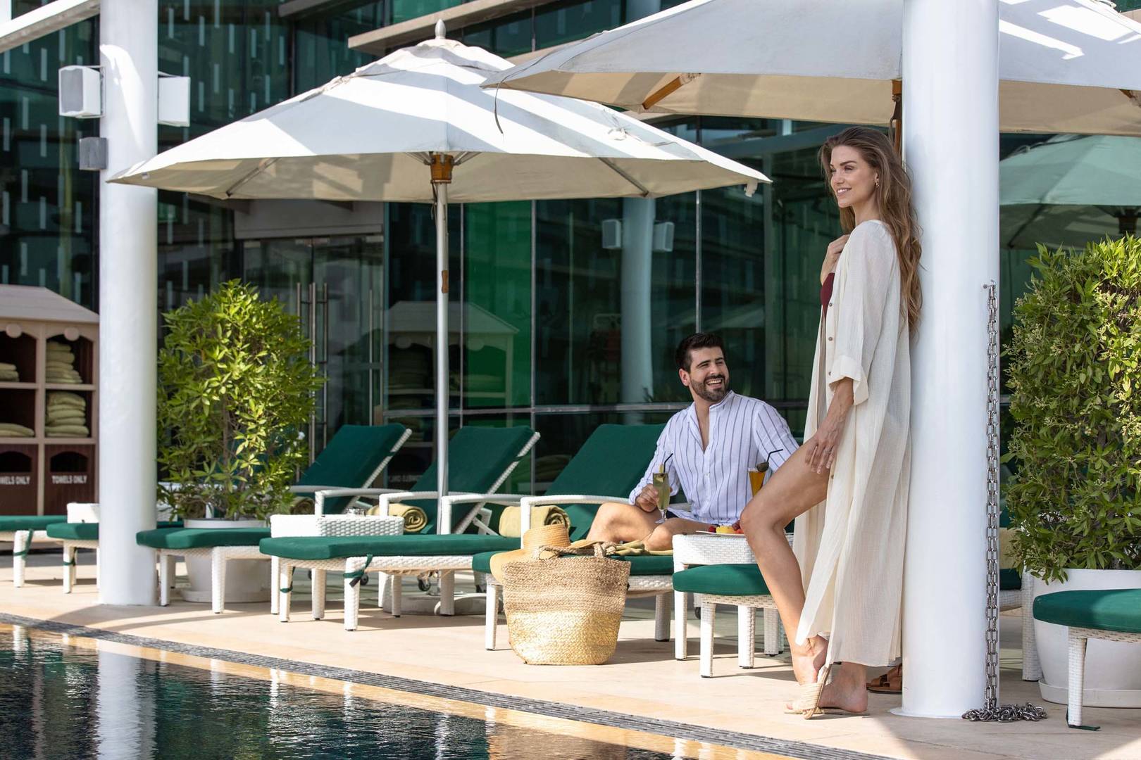 A couple enjoying themselves at Jumeirah Creekside Hotel