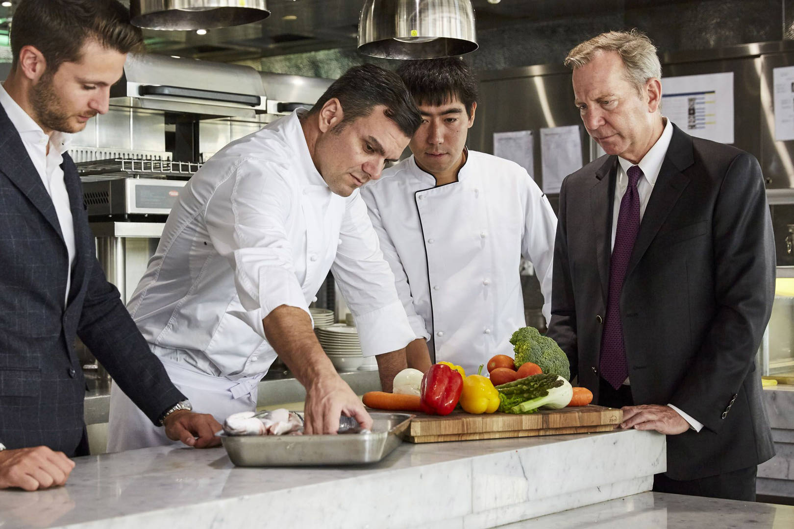 Michael Ellis in the kitchen with chefs