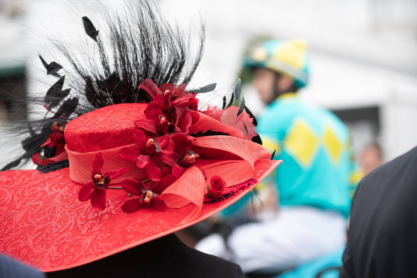 The wearer of a fancy hat at the Royal Ascot horse race