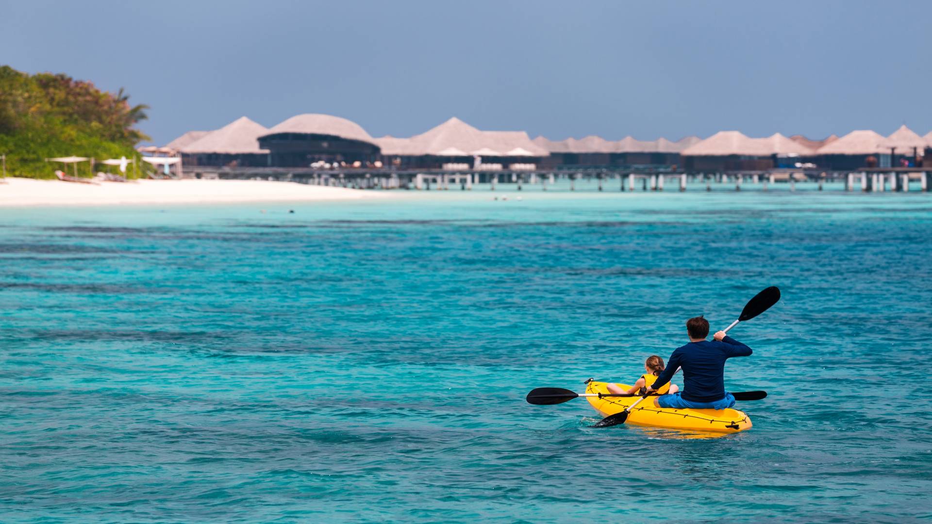 Father and daughter on a kayak