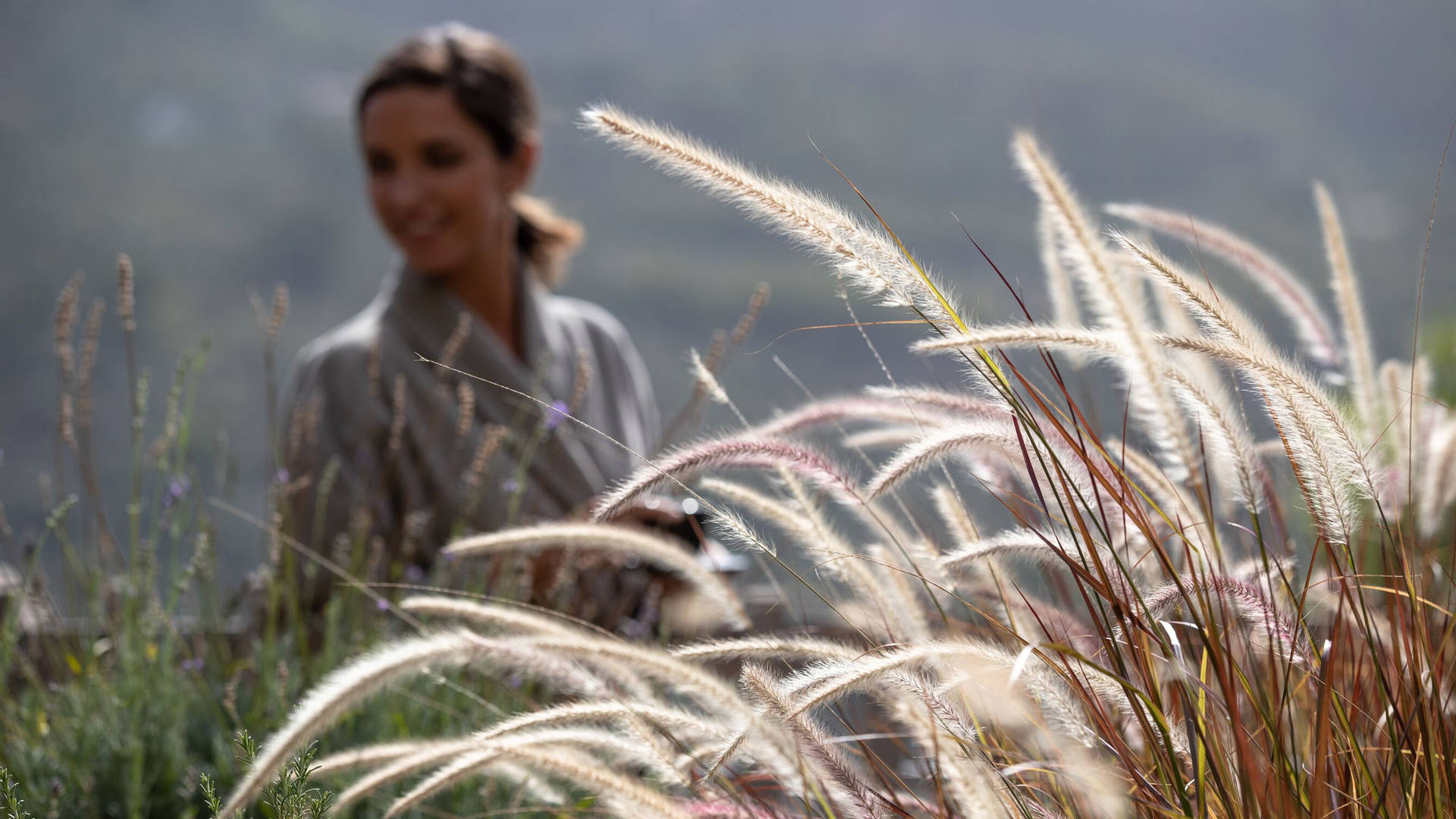 A woman walking in a field