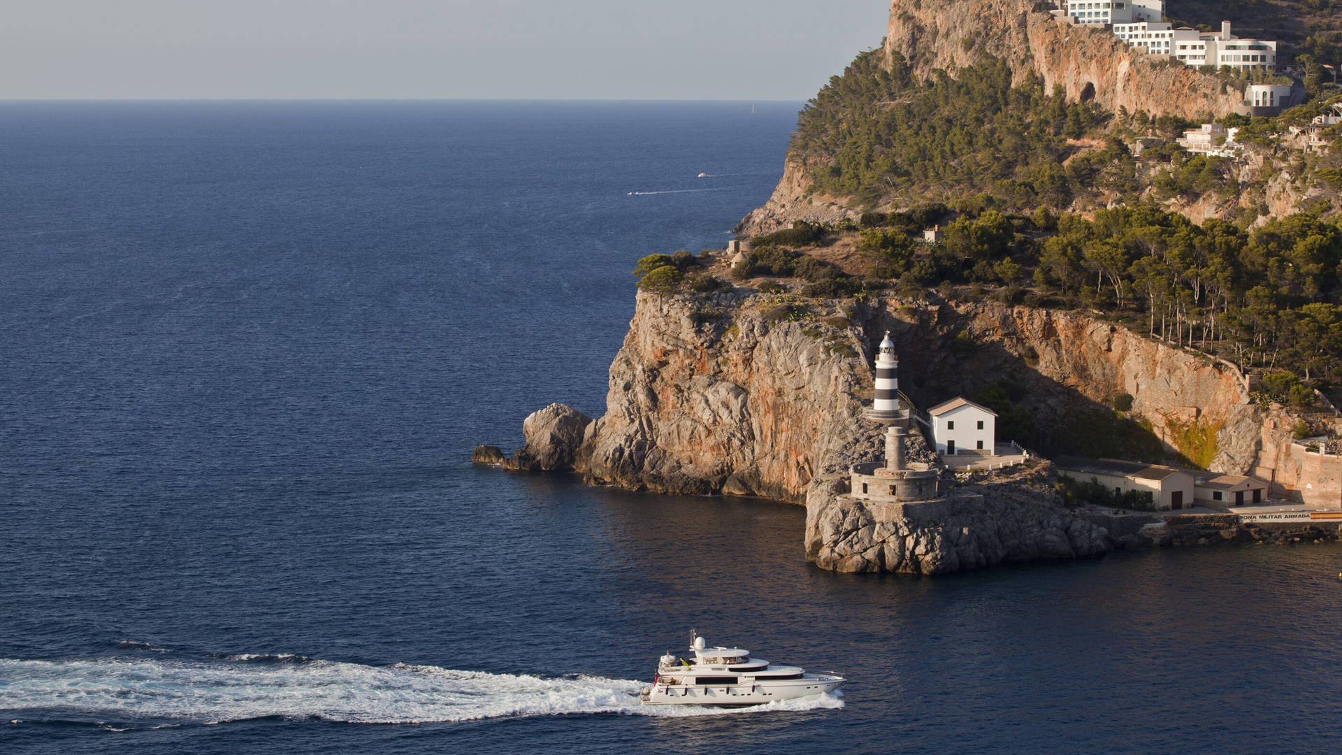  Jumeirah Port Soller Hotel Spa boat and lighthouse