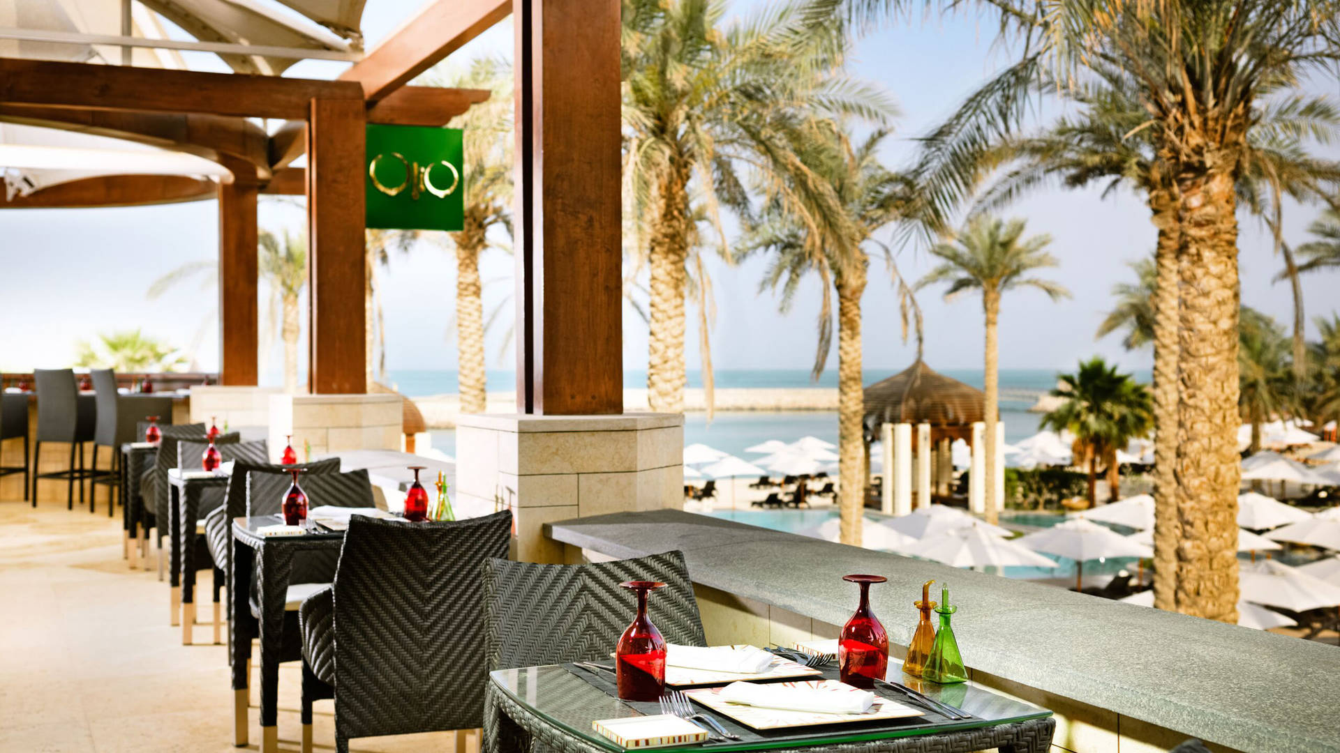 Dining outside at Jumeirah Messilah Beach Hotel 