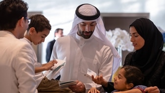 Family checking in at Jumeirah Beach Hotel