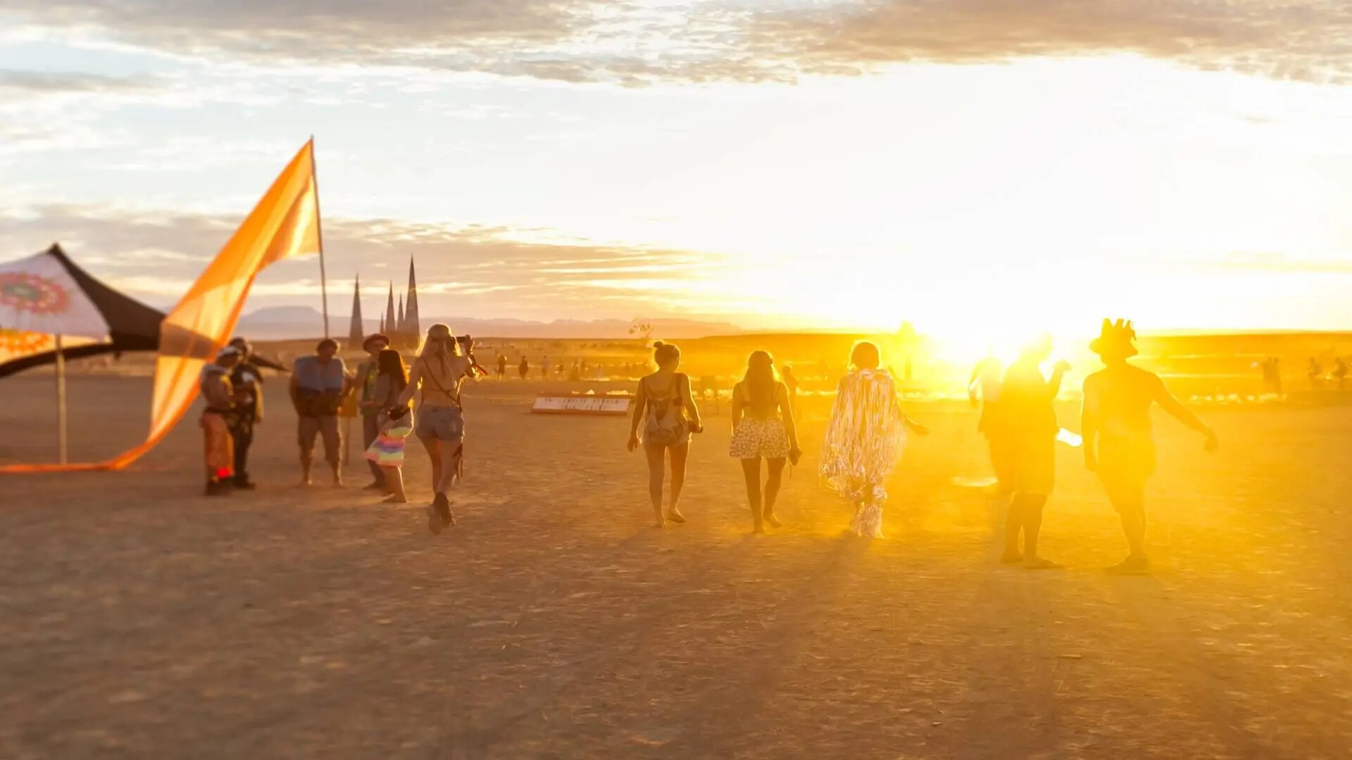 Festival-goers in a desert