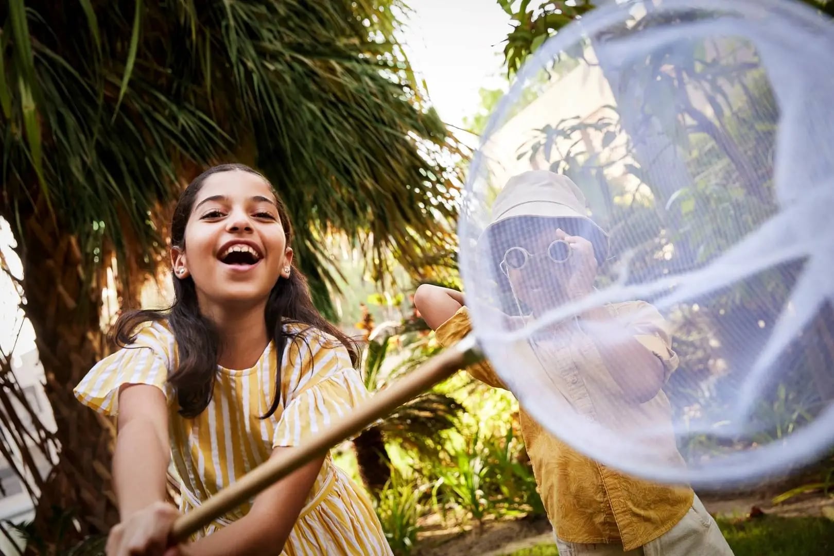 Kids catching butterflies