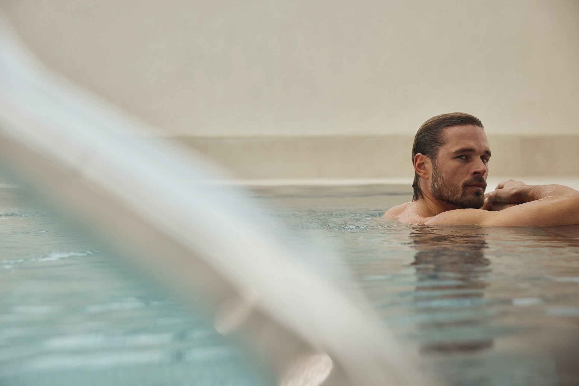 Jumeirah Carlton Tower - Wellness - Model Resting at Pool