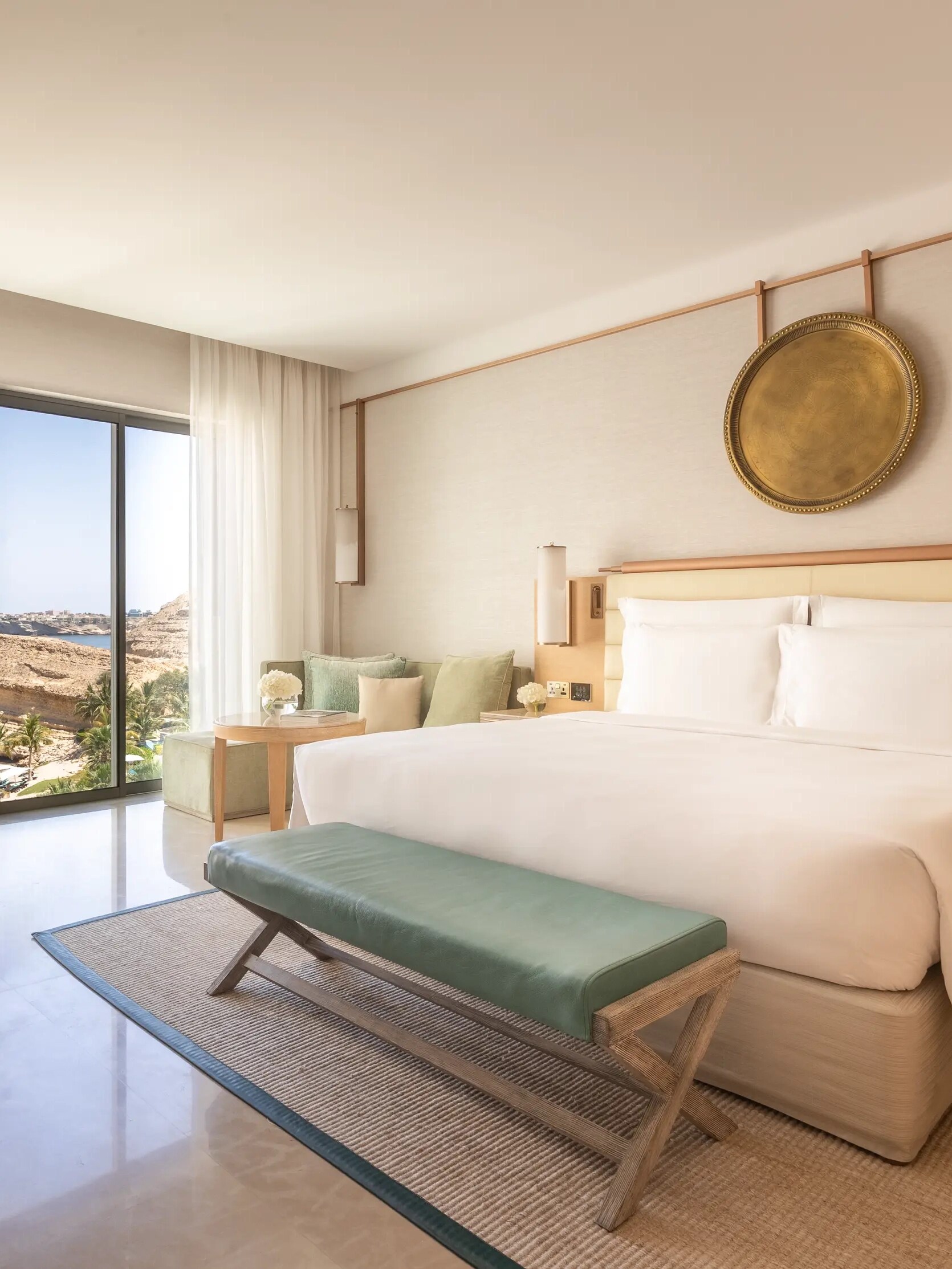 Jumeirah Muscat Bay_Bedroom with view_Deluxe Ocean Room (1)