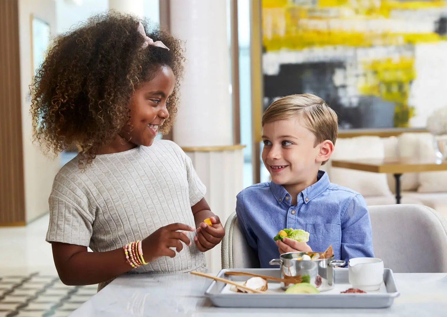 Two kids playing during FoodieKids programme