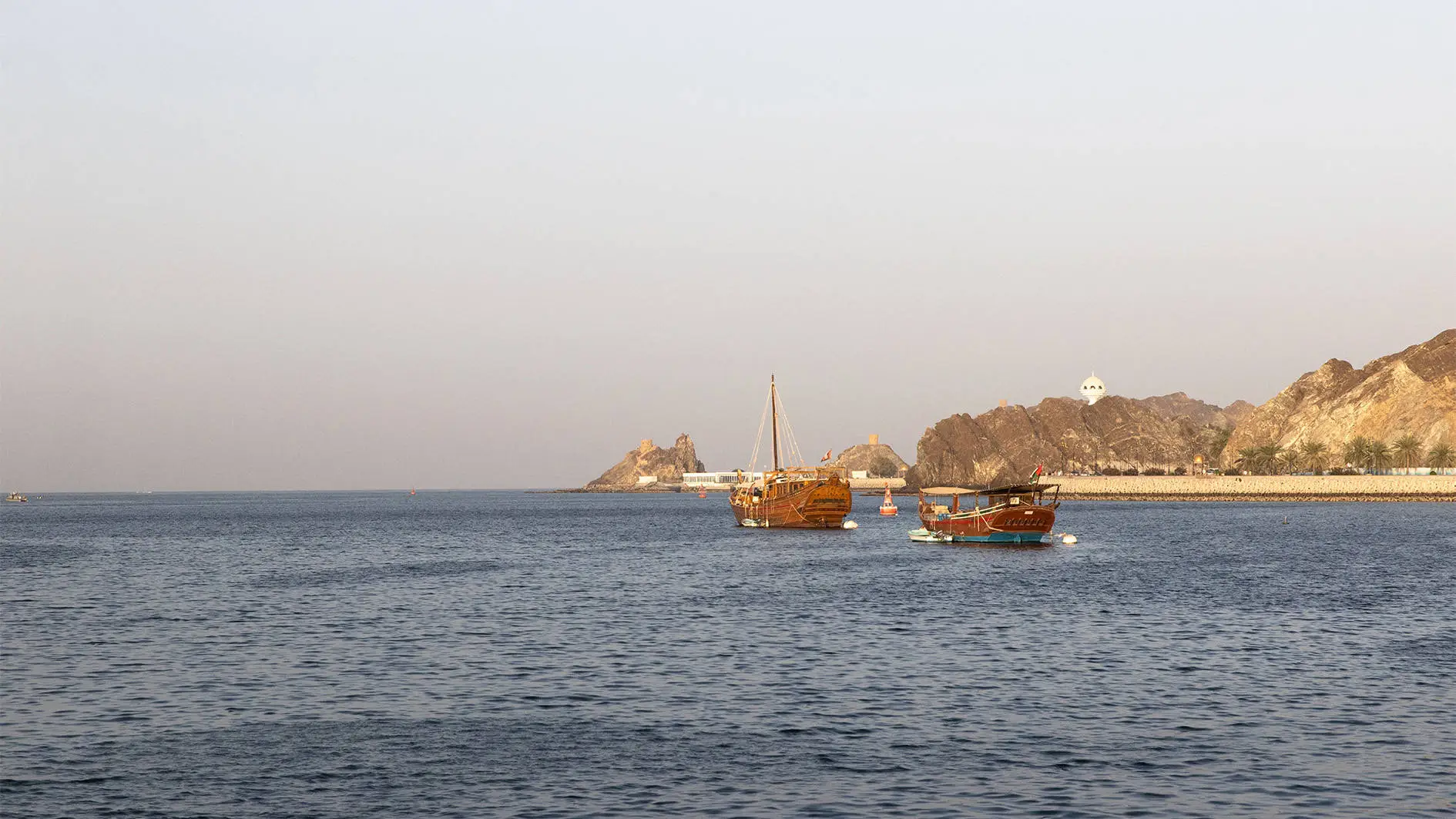 Boats sailing on the Bay of Muscat